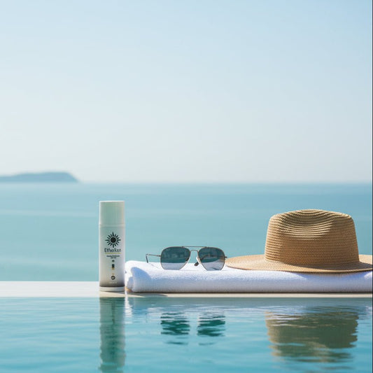 Bottle of Daily Mineral SPF 50+ sunscreen with EthoSun logo and gold label
